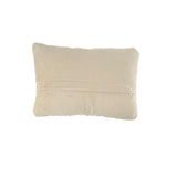 back hooked pillow with orange carrot design on neutral textured background