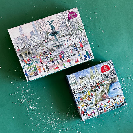 Two jigsaw puzzles depicting winter scenes in Central Park, with holiday decorations and activities.