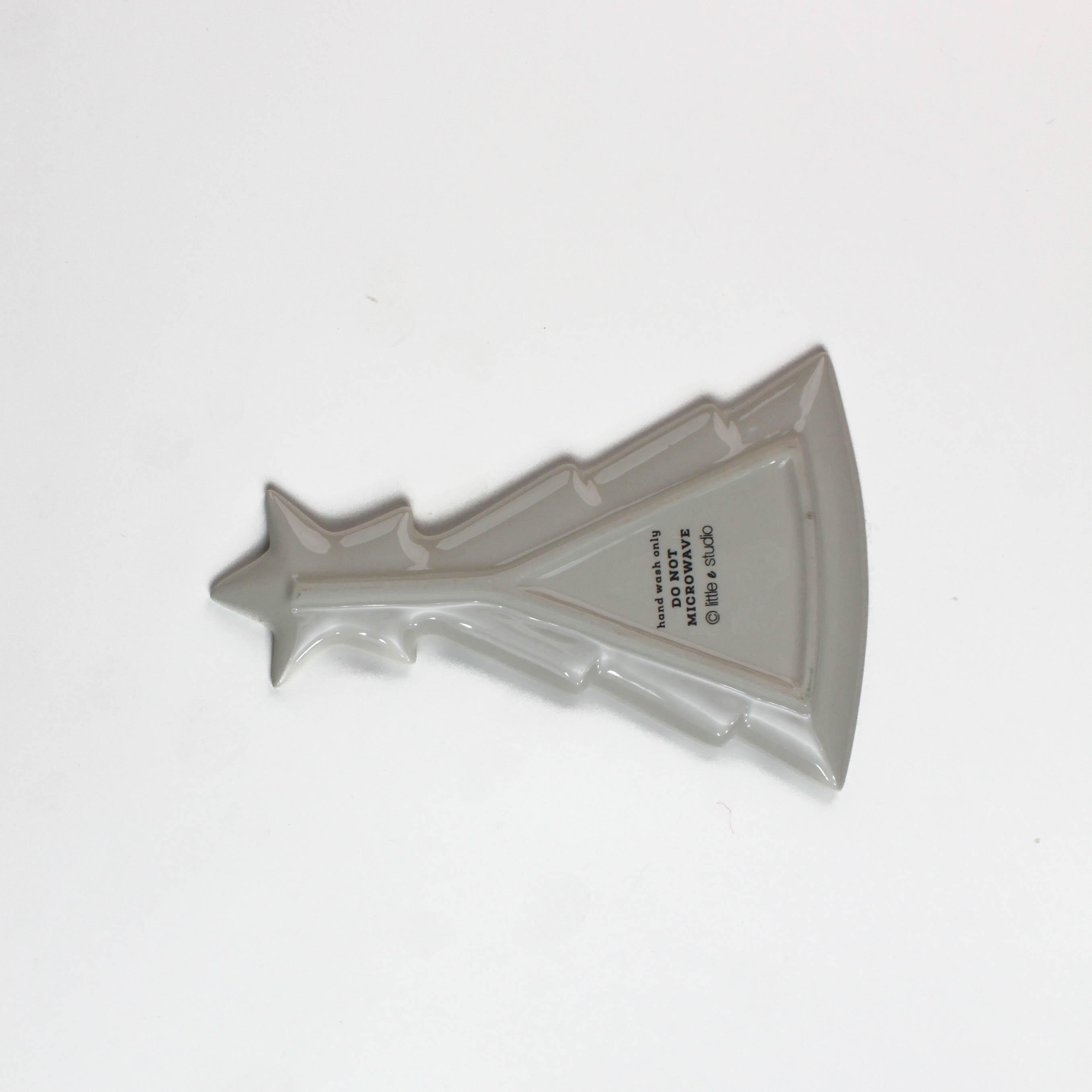 back of a Green ceramic tree accent plate with star at top