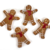 Ceramic gingerbread Christmas accent plate shaped like gingerbread man with red scarf