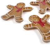Ceramic gingerbread Christmas accent plate shaped like gingerbread man with red scarf