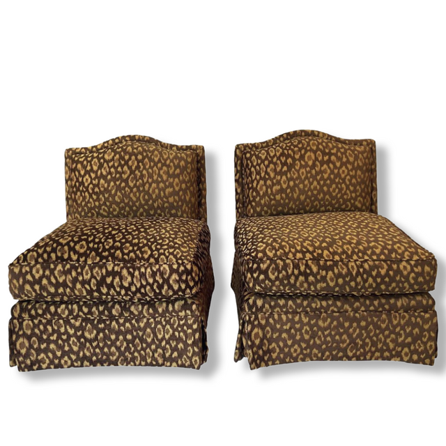 A pair of leopard print chairs