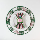 Chinoiserie Pagoda Painted-Metal Napkin Rings with one on a pink, green and white plate dinner napkin