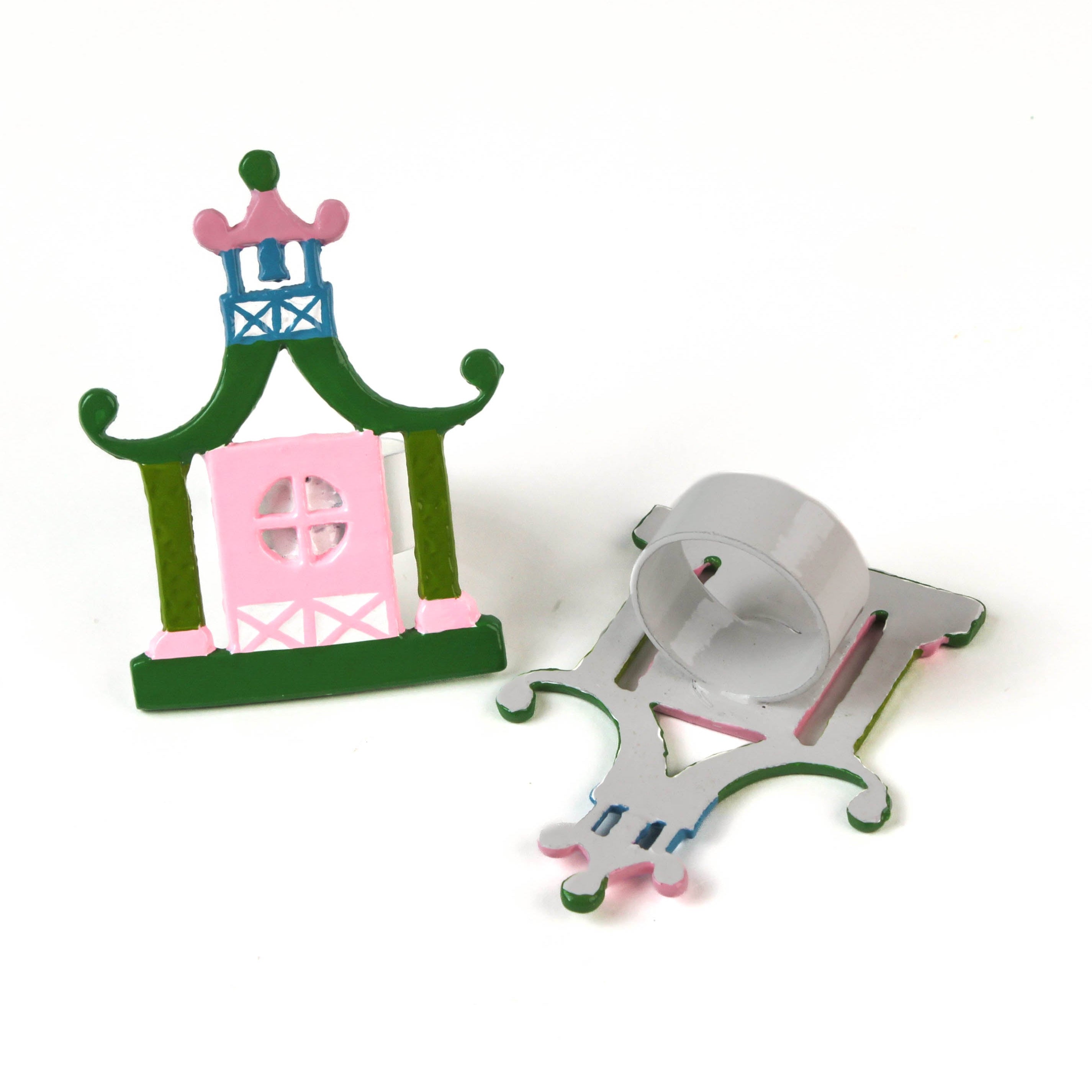 two pink and green pagoda shaped metal chinoiserie napkin rings from madcap cottage. 