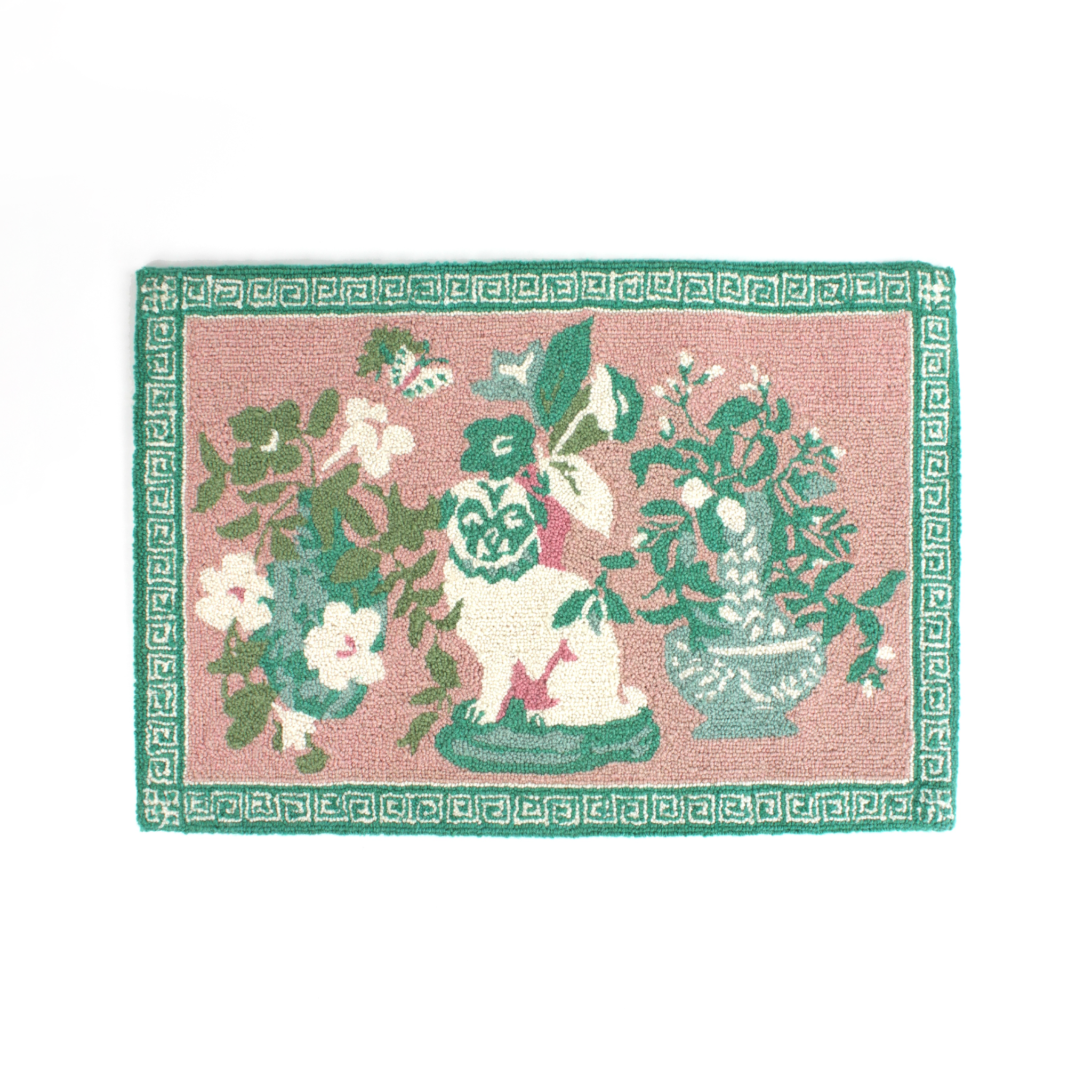 A green and pink rug with a green pug motif and a green geometric border