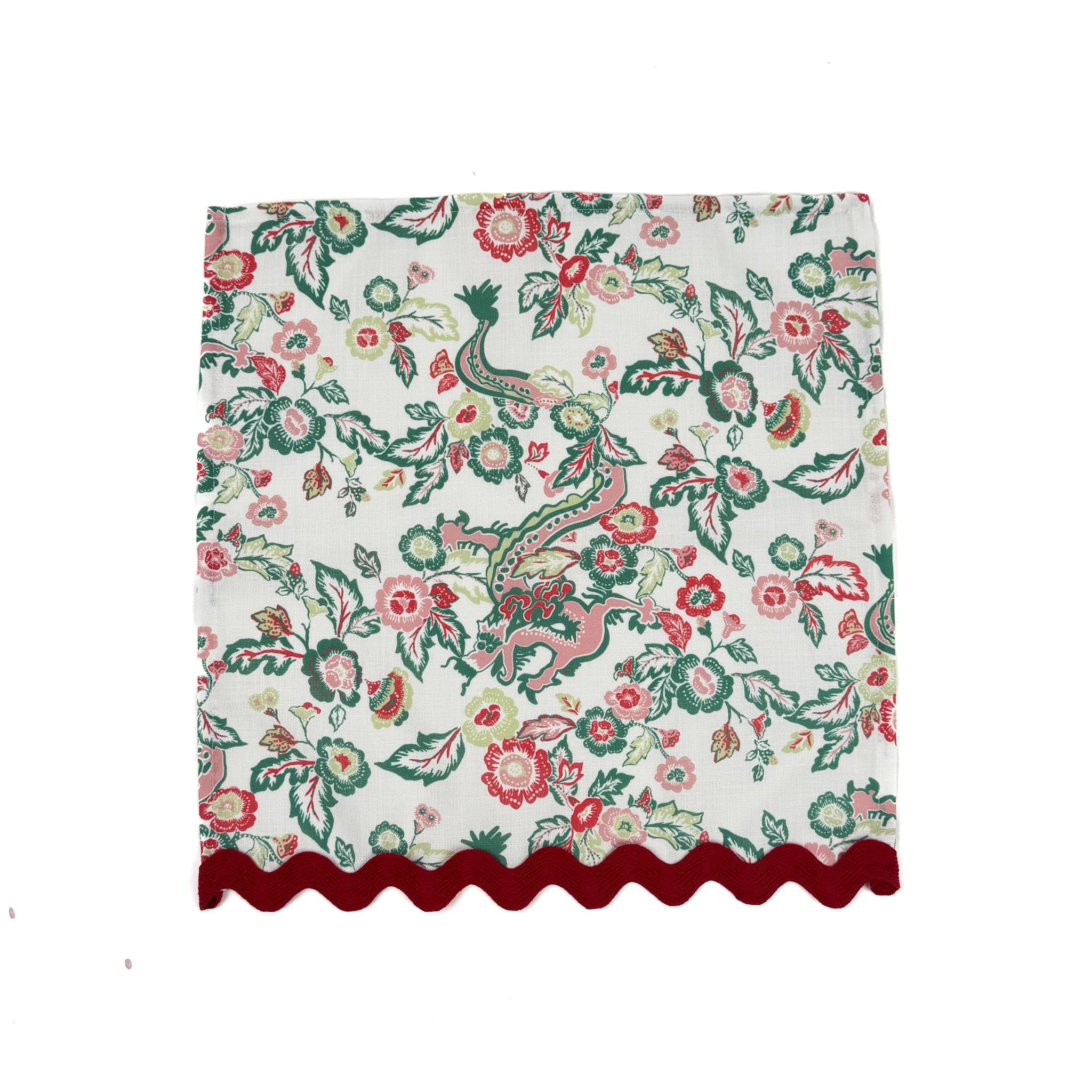 floral and dragon-pattern dinner napkin with red scalloped trim