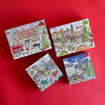 Four jigsaw puzzles depicting Christmas scenes in different European cities, each with distinctive holiday decorations and imagery.
