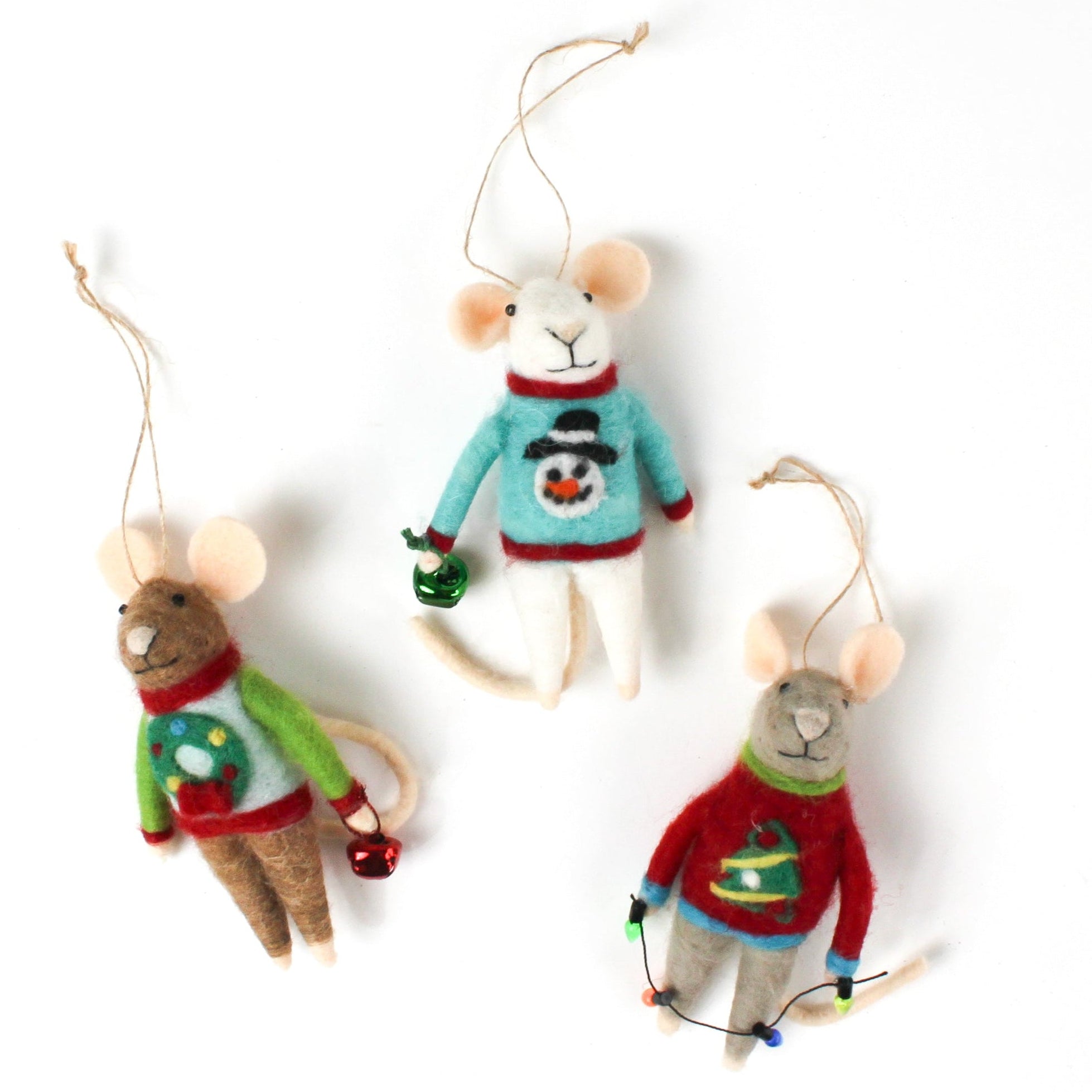 Three felt mouse ornaments dressed in colorful holiday sweaters—one with a snowman, one with a wreath, and one with a Christmas tree—each holding a gift.