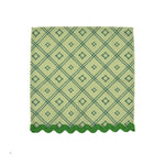 green lattice-pattern dinner napkin with green scalloped trim