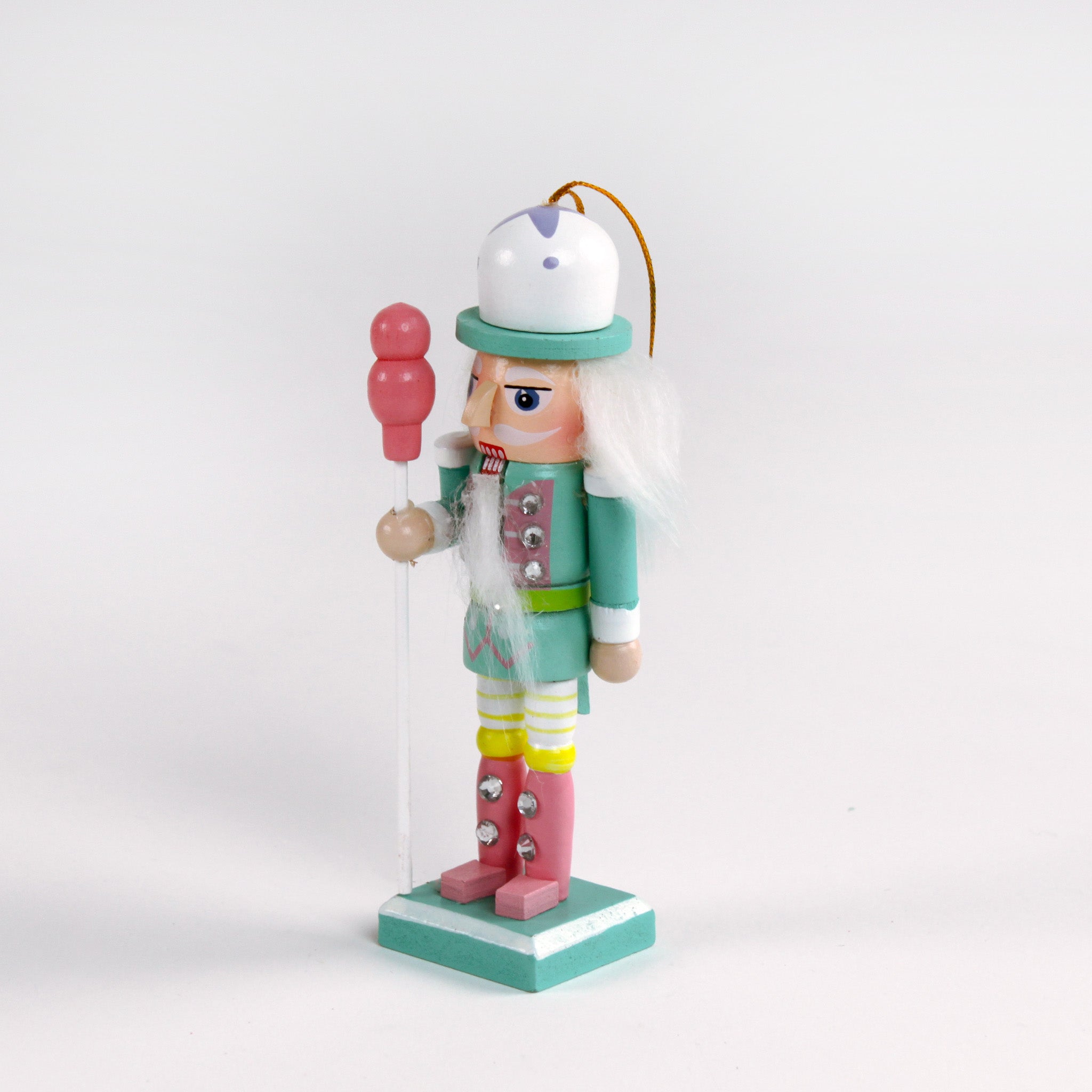 Colorful pastel nutcracker ornaments with candy accents