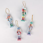 Colorful pastel nutcracker ornaments with candy accents