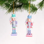 Colorful pastel nutcracker ornaments with candy accents