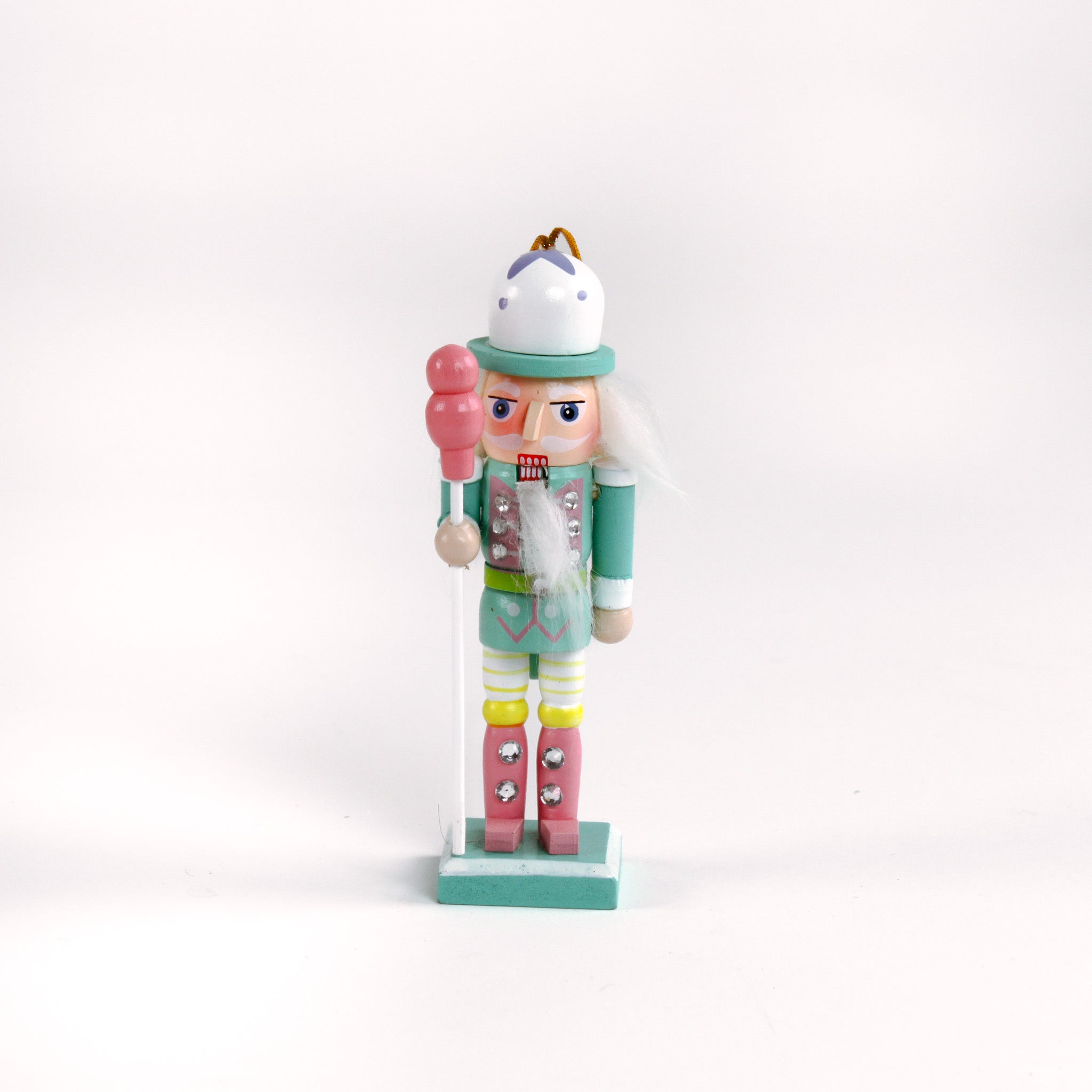 Colorful pastel nutcracker ornaments with candy accents
