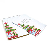 Christmas Pagoda themed Lux Notepads in a white background