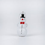 snowman ornament with a top hat, red bow tie, and black buttons on a white background