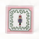 medium Nutcracker Square Acrylic Tray with pink and green border and Nutcracker in the center.