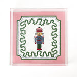 large Nutcracker Square Acrylic Tray  with pink and green border and Nutcracker in the center.