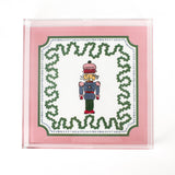 large Nutcracker Square Acrylic Tray  with pink and green border and Nutcracker in the center.