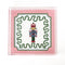 large Nutcracker Square Acrylic Tray  with pink and green border and Nutcracker in the center.