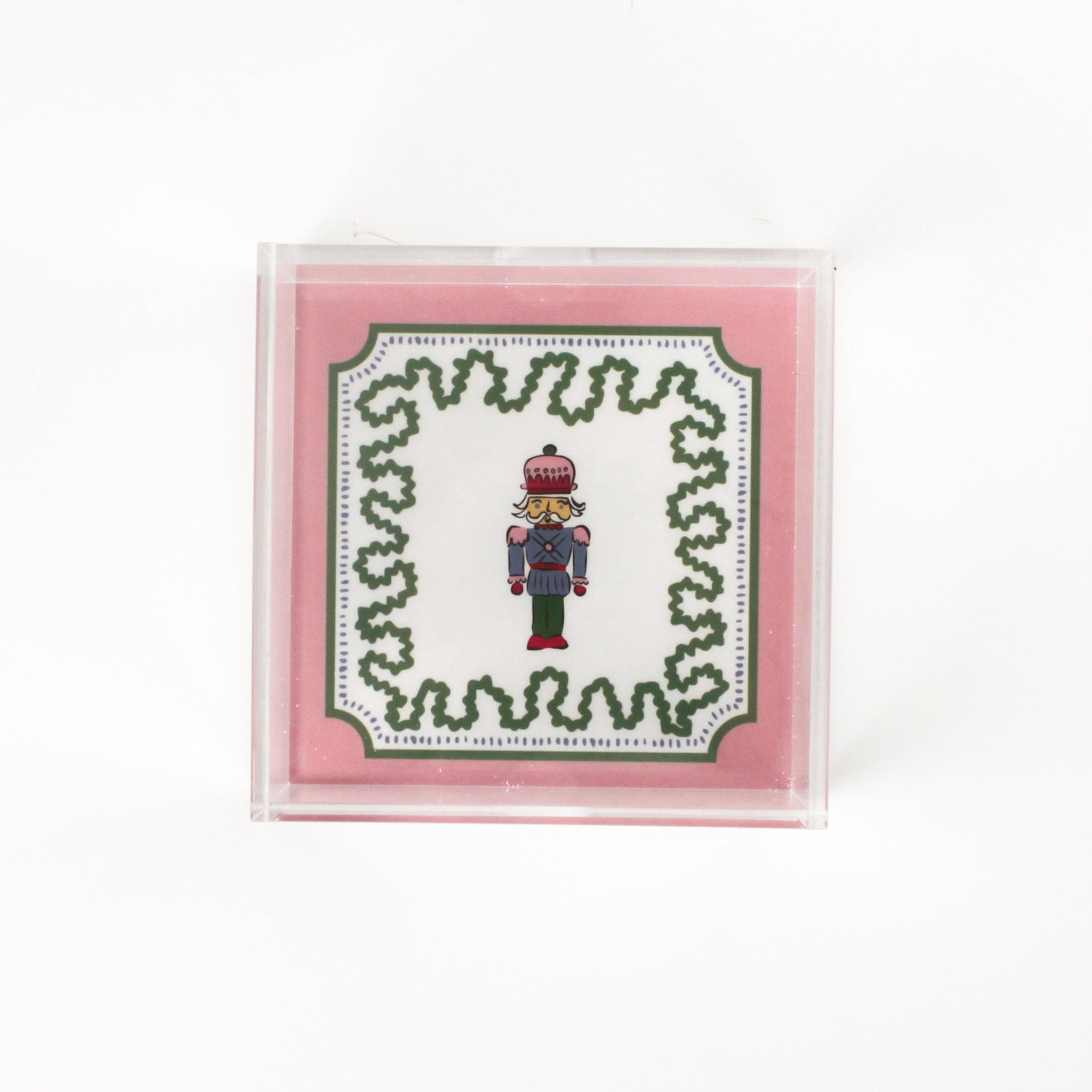 small Nutcracker Square Acrylic Tray with pink and green border and Nutcracker in the center.