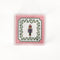 small Nutcracker Square Acrylic Tray with pink and green border and Nutcracker in the center.