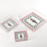 Nutcracker Square Acrylic Tray with in 3 sizes with pink and green border and Nutcracker in the center.
