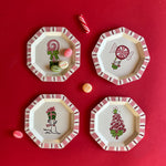 A set of four hand painted tole metal trinket trays featuring Christmas Treats.