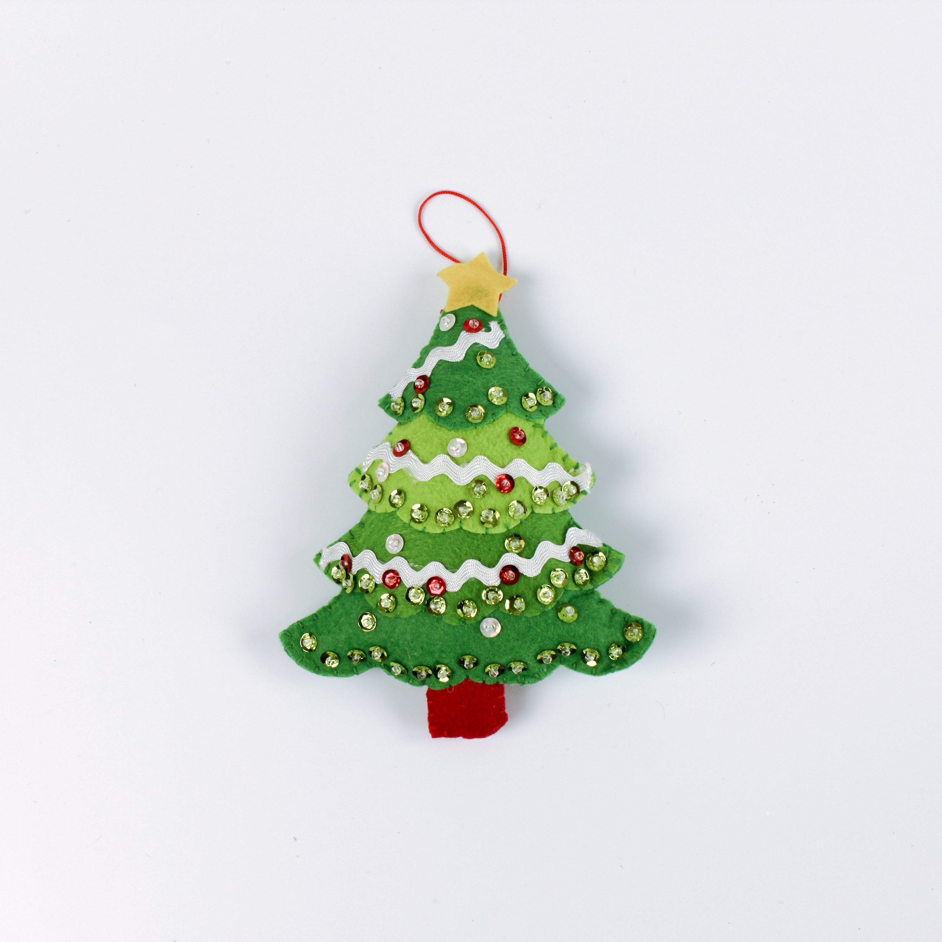 felt Christmas tree ornament featuring a sequined green Christmas tree