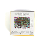 Back of “Christmas in New Orleans” puzzle by Michael Storrings, featuring festive French Quarter illustration with holiday lights, decorated balconies, streetcar, and puzzle information.