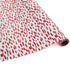 A roll of wrapping paper in painterly patterns and red in color.