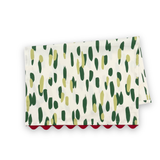 Folded Club House cotton tea towel featuring abstract green brushstrokes on a white background with red scalloped trim.