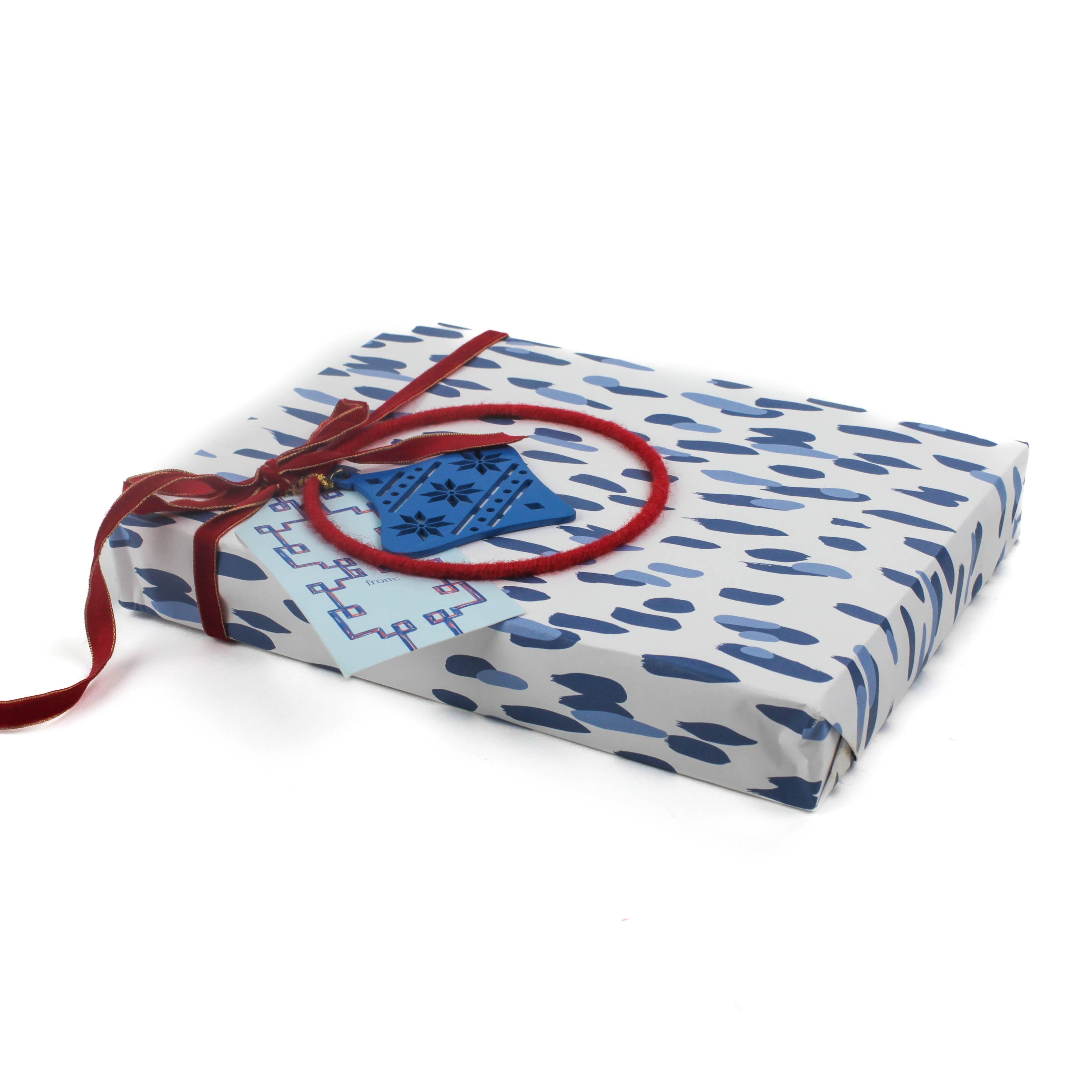 A wrapping paper in painterly patterns and blue in color.