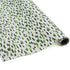 A roll of wrapping paper in painterly patterns and green in color.