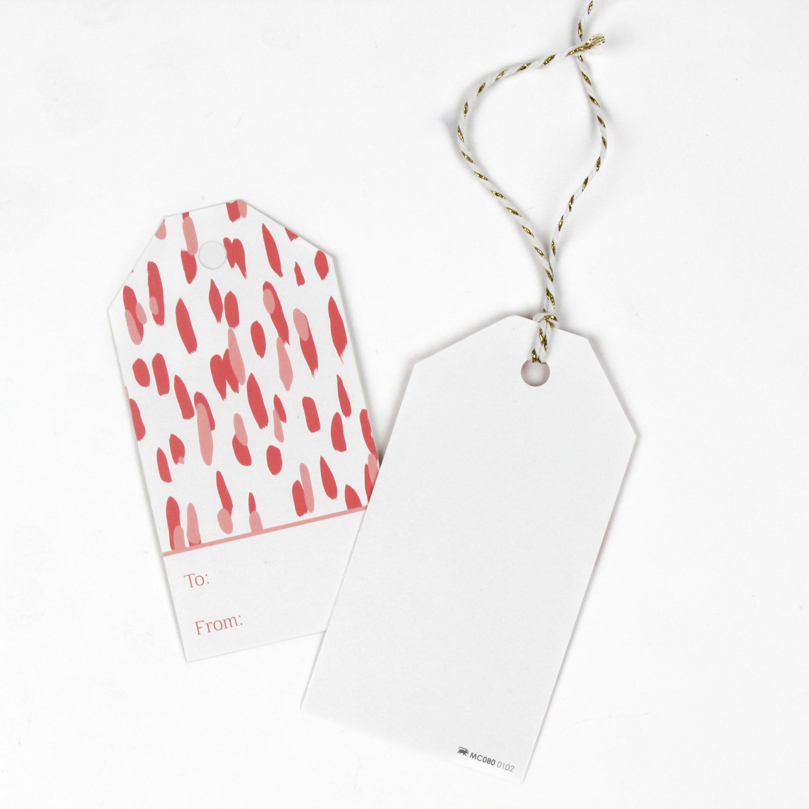 red and white gift tags with a red brushtroke pattern and a white space at the bottom that reads To: and From: