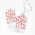 red and white gift tags with a red brushtroke pattern and a white space at the bottom that reads To: and From: