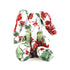 White stuffed elephant toy with red and green floral pattern and green bow.
