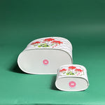 Cottage Grove Geraniums red caddy bottom view in large and small on a green background