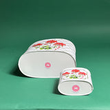 Cottage Grove Geraniums red caddy bottom view in large and small on a green background