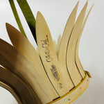 Close-up of daisy-shaped vintage wood basket showing handcrafted wooden petals and maker’s mark