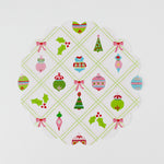 A round paper christmas doily with a christmas ornament pattern from Madcap Cottage. 