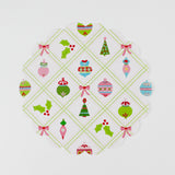 A round paper christmas doily with a christmas ornament pattern from Madcap Cottage. 