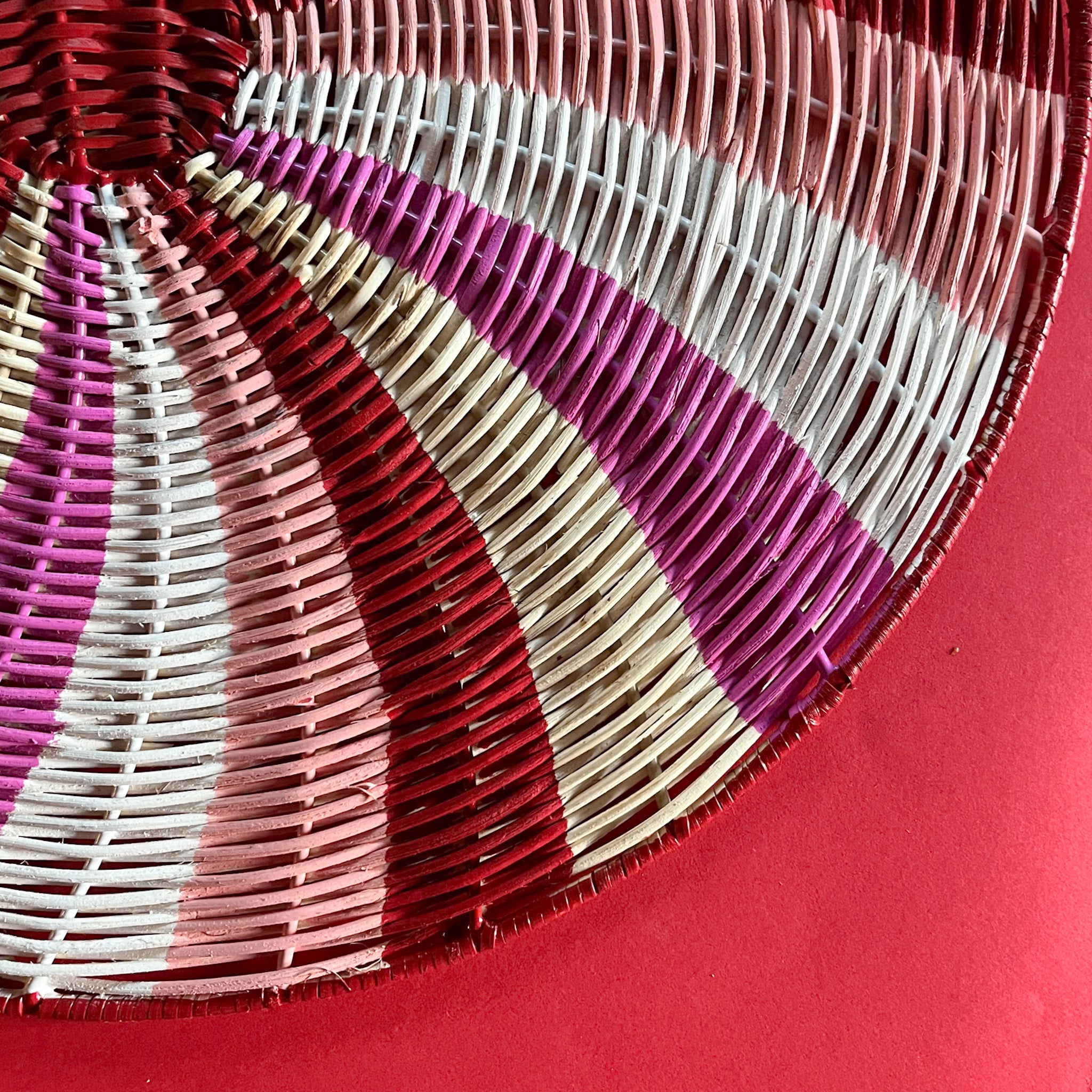 Close up view of the handpainted peppermint rattan charger/placemat