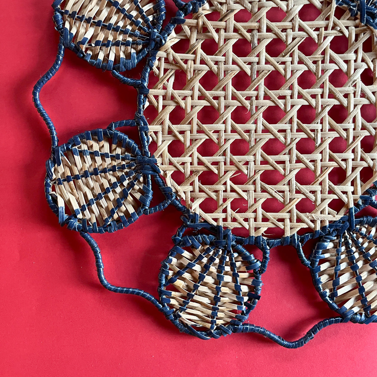 Detailed view of the Shell navy blue placemat/charger.