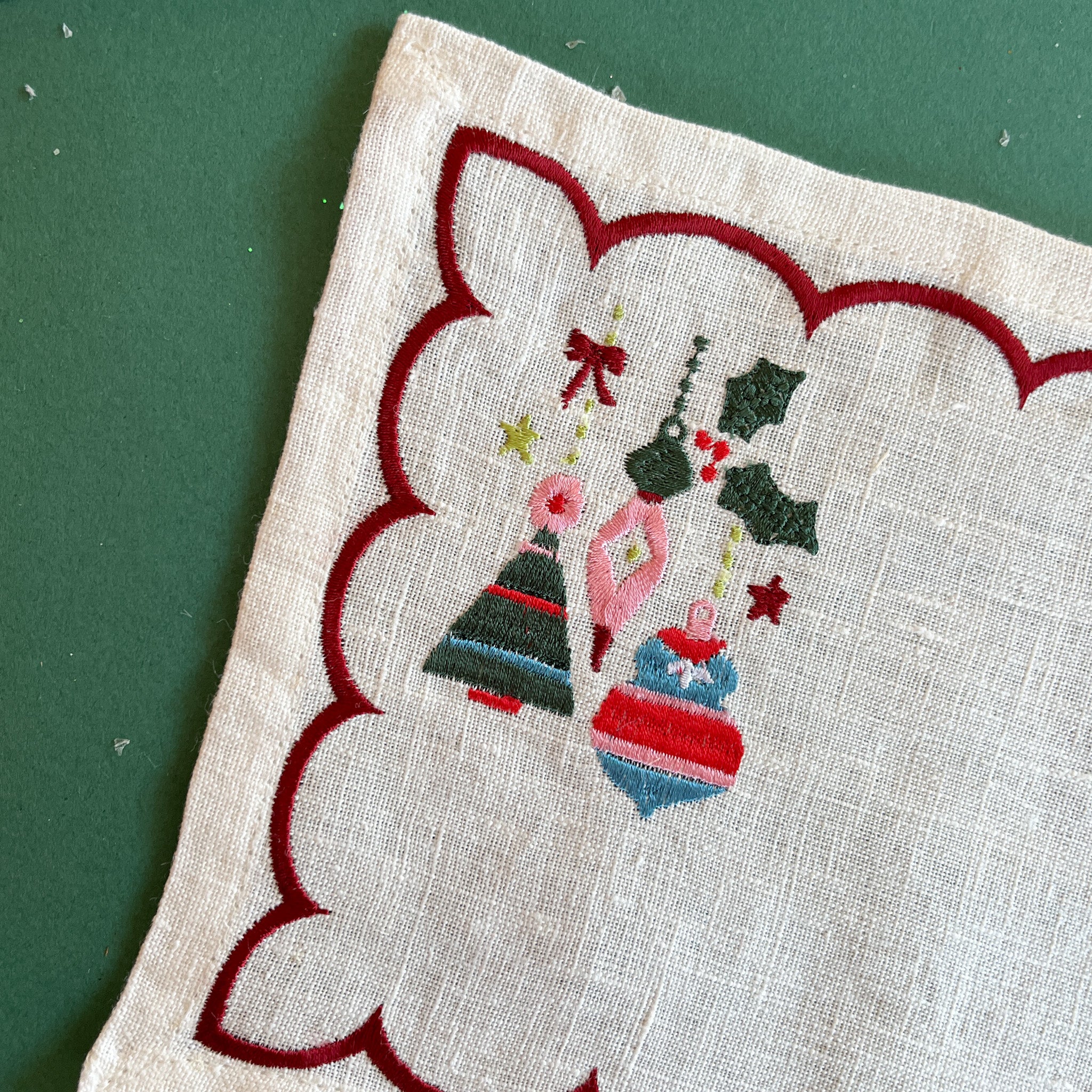 Detail view Darling Ornaments embroidered Christmas cocktail napkins
