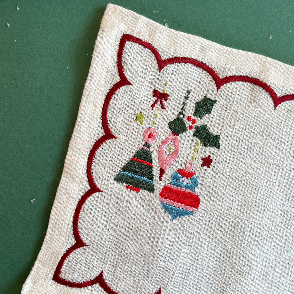Detail view Darling Ornaments embroidered Christmas cocktail napkins