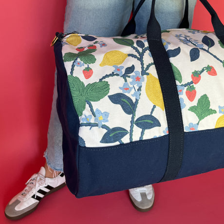 Detailed shot with model of Strawberry Hill canvas duffle