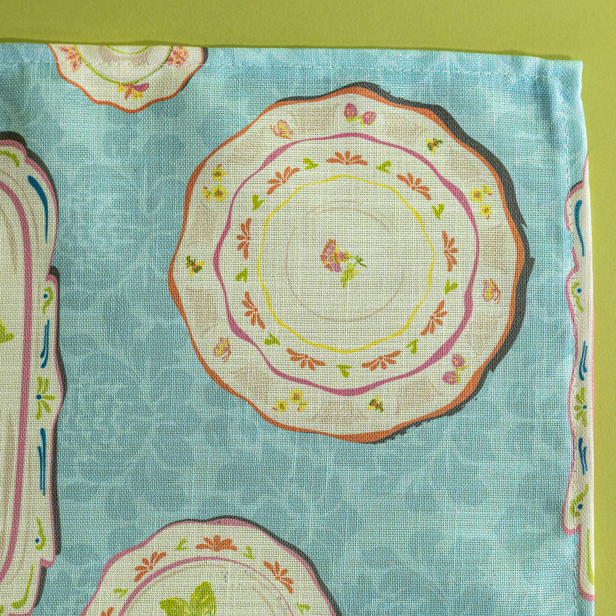 Close up of blue vintage plates fabric spring napkins