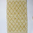 A cotton yellow accent rug with a repeating diamond motif from Madcap Cottage. 