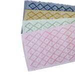 4 cotton accent rugs in blue, yellow, green and pink with a repeating diamond motif from madcap cottage