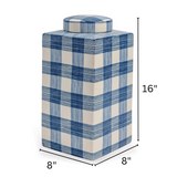 A blue and white lidded jar with arrows denoting dimentions 16" high by 8" wide and 8" deep 